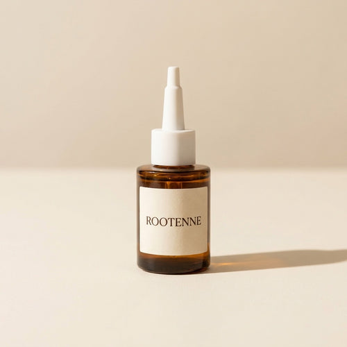 Aceite capilar nutritivo ROOTENNE en frasco ámbar